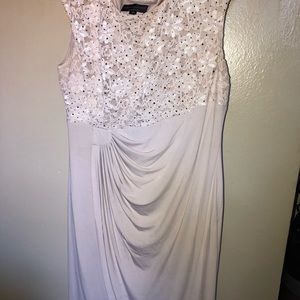 A dazzling long cream dress